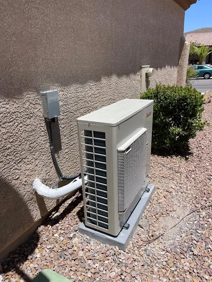 Residential air conditioning condenser unit in Ward
